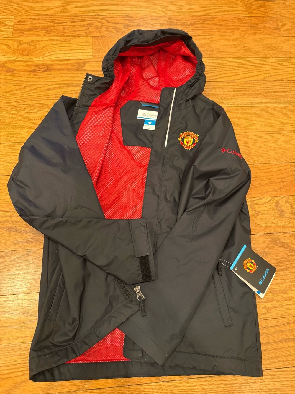 NWT Columbia Black Youth Jacket with Red Lining and Manchester United Crest- YM